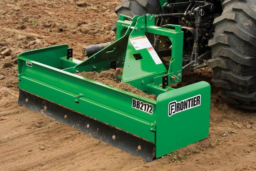 A box blade can help to spread soil evenly